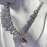 Stylish chunky stainless steel necklace featuring a heart charm