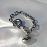 Stainless steel bracelet with charm.