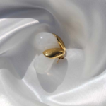 Gold plated stainless steel earrings with a drop shape semiprecious gem.