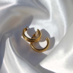 Gold plated stainless steel hoop earrings.